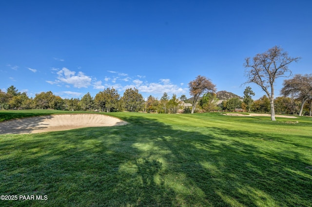 surrounding community with a yard