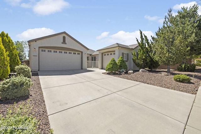 single story home featuring a garage