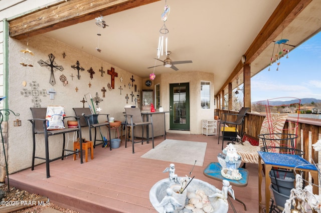 deck with a ceiling fan