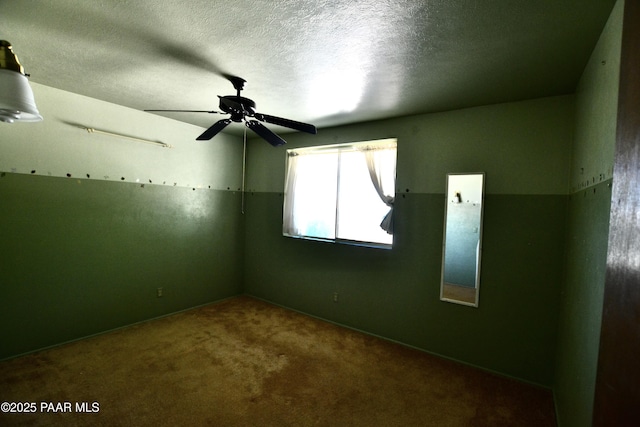 856 E Damion Loop, Chino Valley, AZ 86323 - empty room featuring carpet flooring, ceiling fan, and a textured ceiling