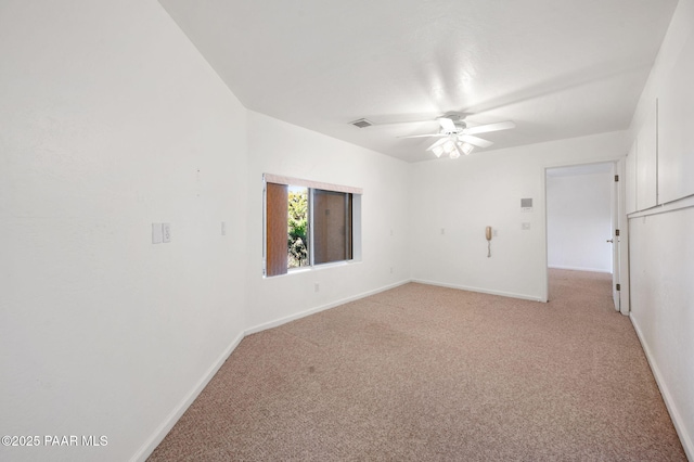 carpeted empty room with ceiling fan