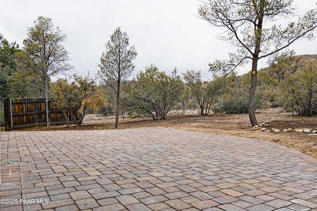 view of patio / terrace featuring fence