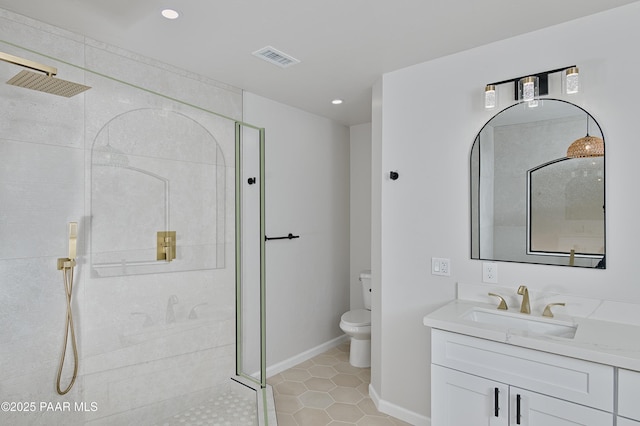 full bath with visible vents, a shower stall, toilet, recessed lighting, and vanity