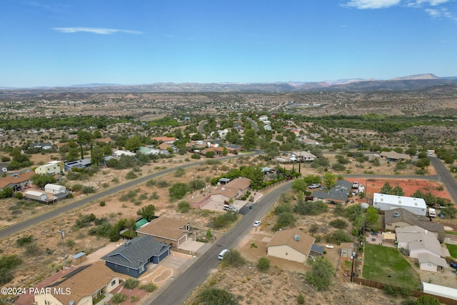 drone / aerial view featuring a mountain view