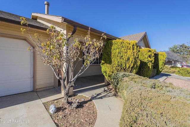 exterior space with a garage