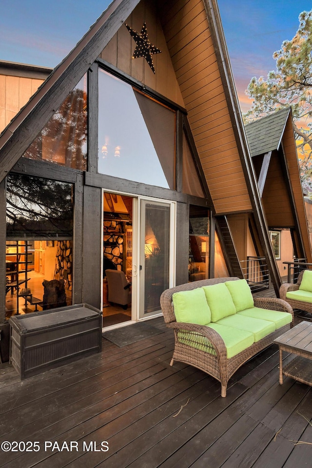 1520 W Sylvan Dr, Prescott, AZ 86305 - deck at dusk with outdoor lounge area