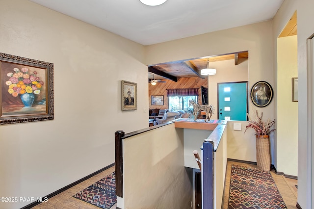 1520 W Sylvan Dr, Prescott, AZ 86305 - kitchen with wood walls, beamed ceiling, baseboards, and ceiling fan