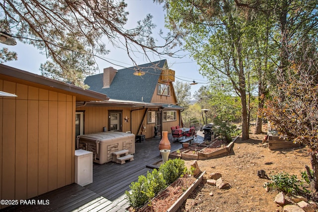 1520 W Sylvan Dr, Prescott, AZ 86305 - wooden terrace featuring a vegetable garden and a hot tub