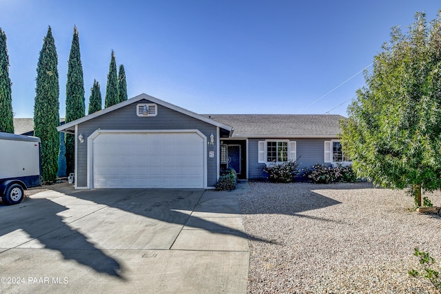 ranch-style house with a garage