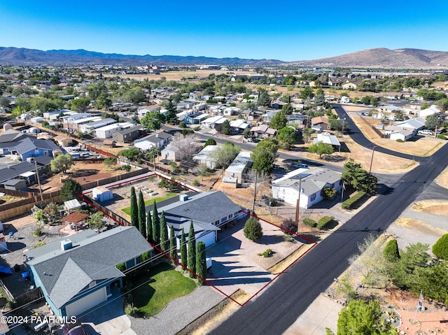 drone / aerial view featuring a mountain view