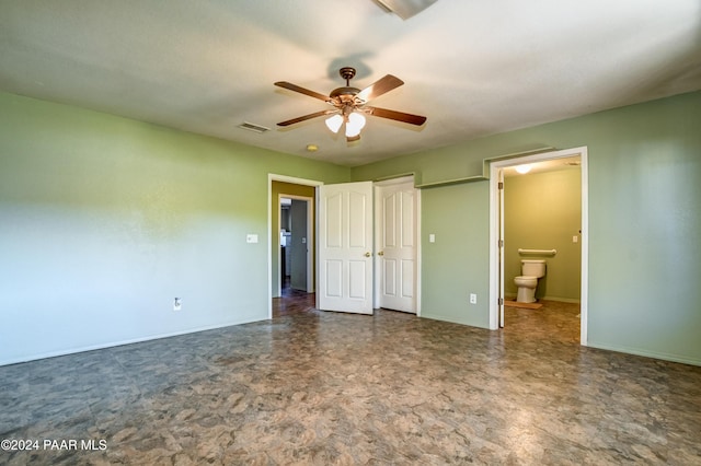 unfurnished bedroom with ensuite bath and ceiling fan