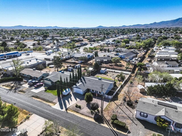 birds eye view of property featuring a mountain view