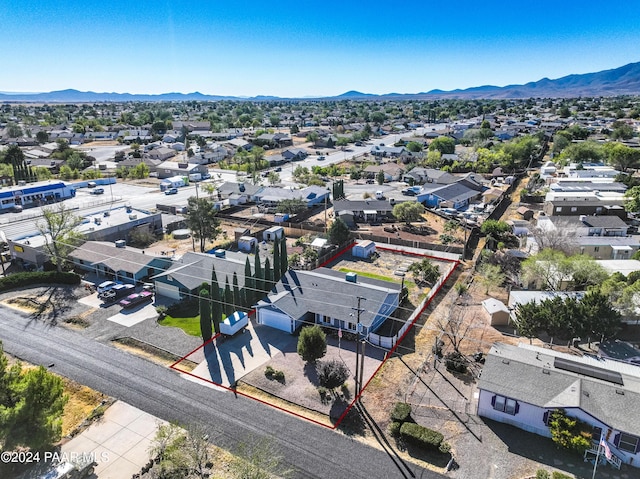 drone / aerial view featuring a mountain view