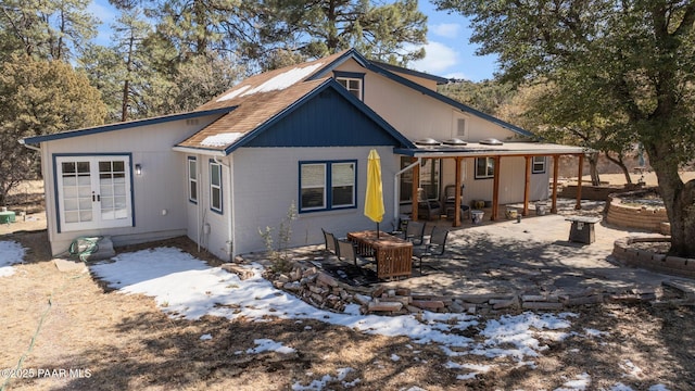 1467 N Vyne St, Prescott, AZ 86305 - snow covered property with french doors and a patio