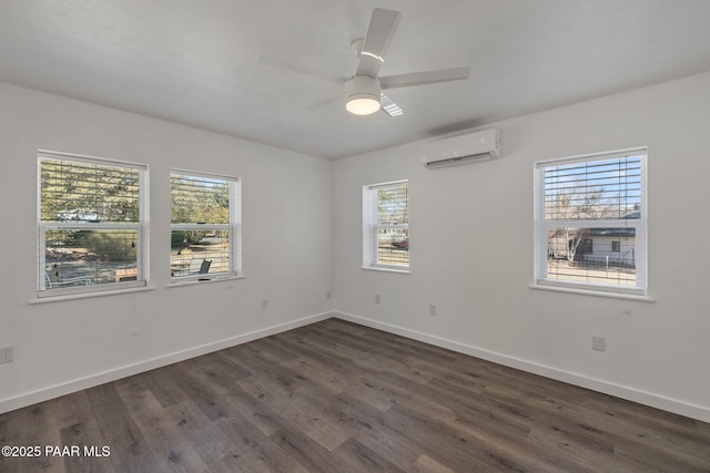 1467 N Vyne St, Prescott, AZ 86305 - unfurnished room featuring a ceiling fan, dark wood-style floors, an AC wall unit, and baseboards
