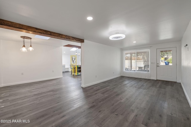 1467 N Vyne St, Prescott, AZ 86305 - unfurnished living room with recessed lighting, beam ceiling, baseboards, and dark wood finished floors