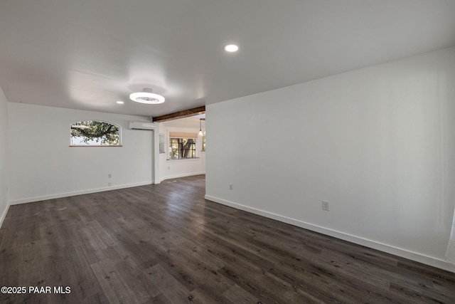 1467 N Vyne St, Prescott, AZ 86305 - empty room featuring baseboards, a wall mounted AC, recessed lighting, and dark wood finished floors