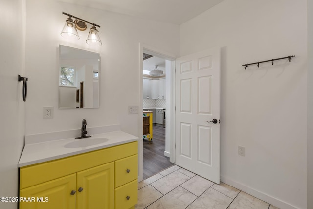 1467 N Vyne St, Prescott, AZ 86305 - bathroom with baseboards, tasteful backsplash, and vanity