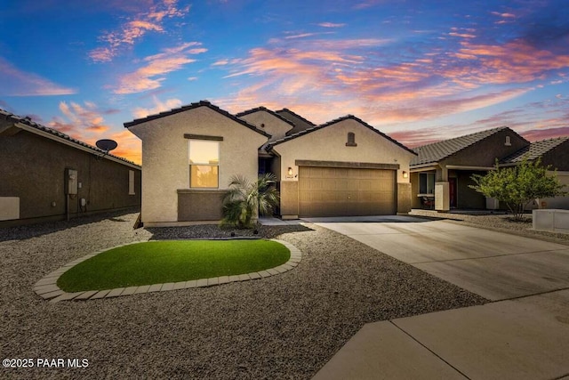 10429 W Crown King Rd, Tolleson, AZ 85353 - ranch-style house with concrete driveway, a garage, stucco siding, and a tile roof