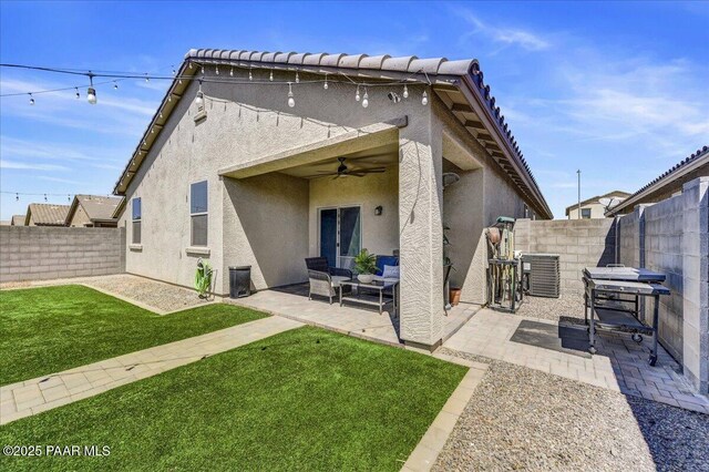 10429 W Crown King Rd, Tolleson, AZ 85353 - rear view of property with ceiling fan, stucco siding, and a patio area