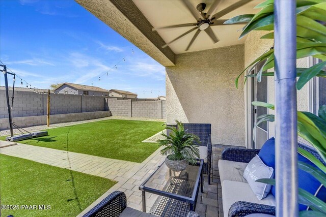 10429 W Crown King Rd, Tolleson, AZ 85353 - view of patio with a ceiling fan and an outdoor living space