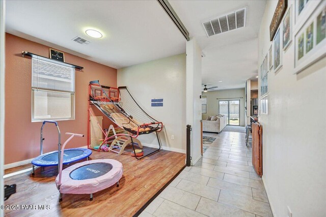 10429 W Crown King Rd, Tolleson, AZ 85353 - corridor with light tile patterned floors and baseboards