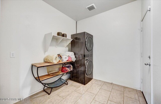 10429 W Crown King Rd, Tolleson, AZ 85353 - washroom featuring stacked washer and clothes dryer