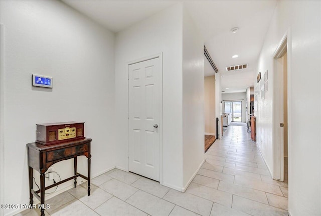 10429 W Crown King Rd, Tolleson, AZ 85353 - corridor featuring light tile patterned floors, baseboards, and recessed lighting