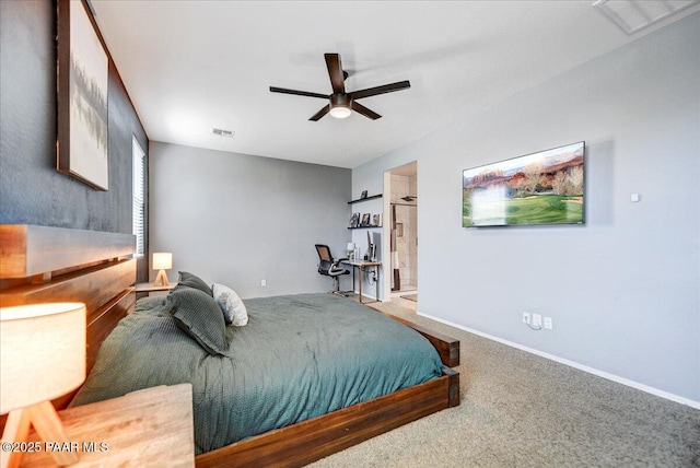 10429 W Crown King Rd, Tolleson, AZ 85353 - bedroom featuring carpet floors, baseboards, ensuite bath, and a ceiling fan