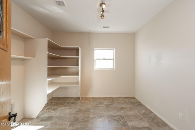 interior space with rail lighting