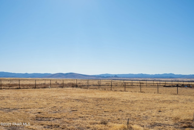 property view of mountains featuring a rural view