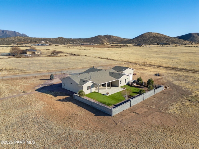 drone / aerial view featuring a mountain view