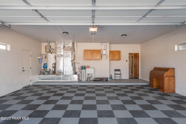 garage with sink and a garage door opener