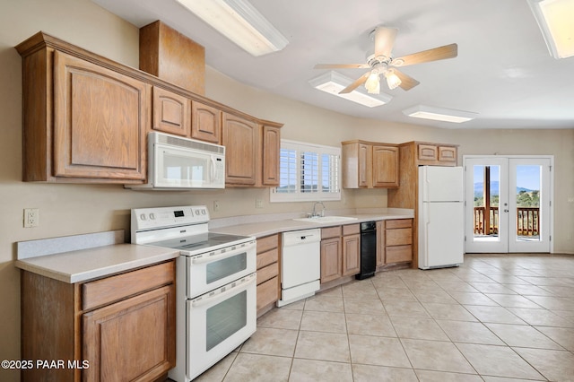 18900 N Butte Pass Rd, Prescott, AZ 86305 - kitchen featuring white appliances, a sink, french doors, and light countertops