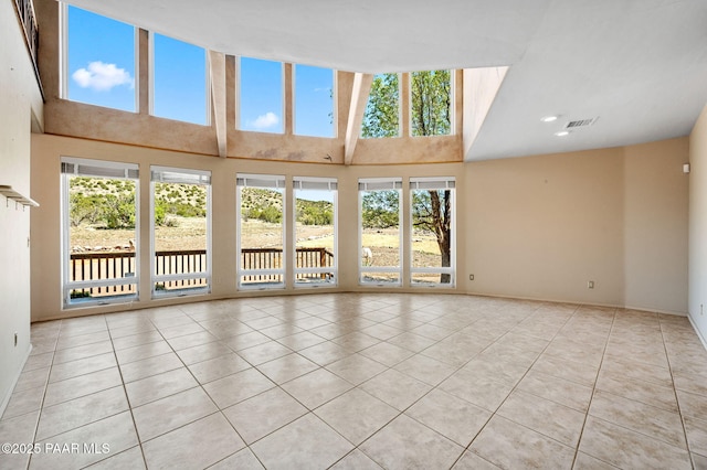 18900 N Butte Pass Rd, Prescott, AZ 86305 - unfurnished living room with light tile patterned flooring, baseboards, and recessed lighting