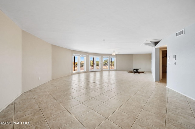 18900 N Butte Pass Rd, Prescott, AZ 86305 - spare room featuring light tile patterned floors and a ceiling fan