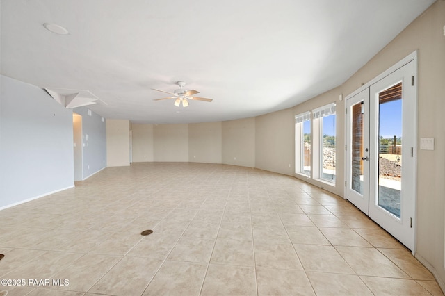 18900 N Butte Pass Rd, Prescott, AZ 86305 - unfurnished room with light tile patterned floors and ceiling fan