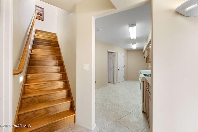 18900 N Butte Pass Rd, Prescott, AZ 86305 - staircase with tile patterned flooring and baseboards