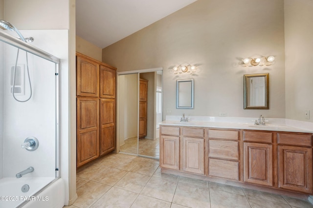18900 N Butte Pass Rd, Prescott, AZ 86305 - bathroom with vaulted ceiling, tile patterned flooring,  shower combination, and double vanity