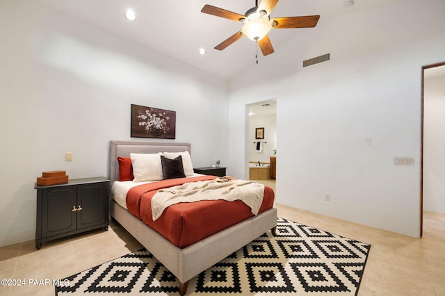 bedroom featuring light tile patterned floors, ensuite bathroom, high vaulted ceiling, and ceiling fan