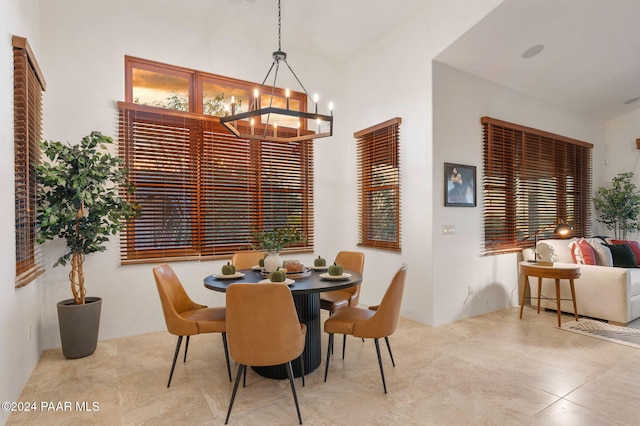 dining space featuring a chandelier