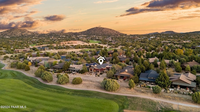 aerial view at dusk with a mountain view