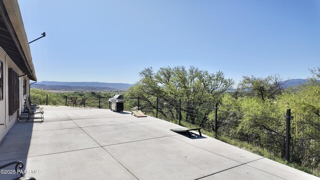 477 W State Route 260, Camp Verde, AZ 86322 - view of patio featuring a mountain view, fence, and area for grilling