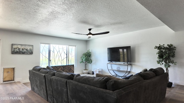 477 W State Route 260, Camp Verde, AZ 86322 - living area with a textured ceiling, baseboards, ceiling fan, and wood finished floors