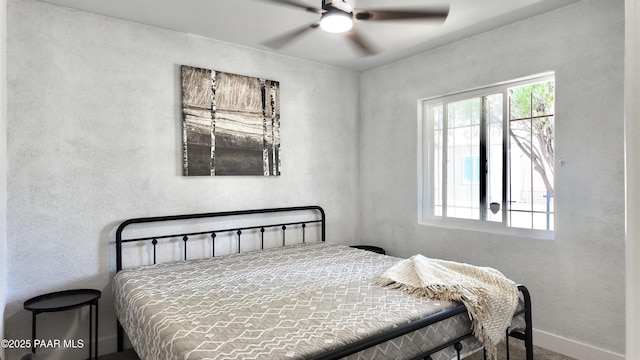 477 W State Route 260, Camp Verde, AZ 86322 - bedroom featuring a textured wall, ceiling fan, multiple windows, and baseboards