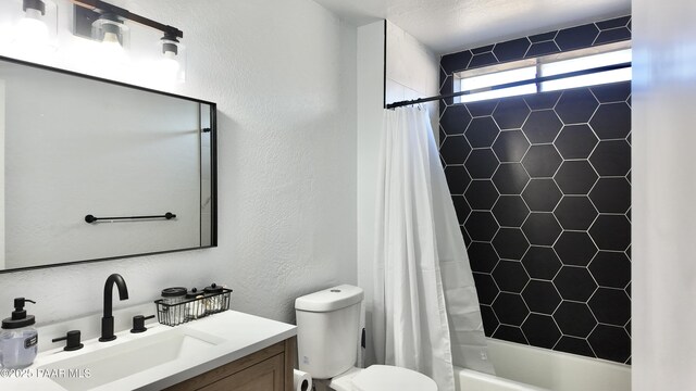477 W State Route 260, Camp Verde, AZ 86322 - full bathroom featuring vanity, a textured wall, shower / bath combo with shower curtain, and toilet