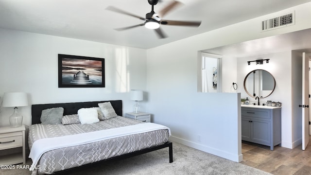 477 W State Route 260, Camp Verde, AZ 86322 - bedroom with connected bathroom, a ceiling fan, baseboards, and visible vents