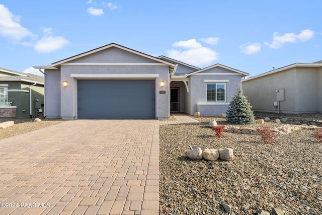 ranch-style house with a garage