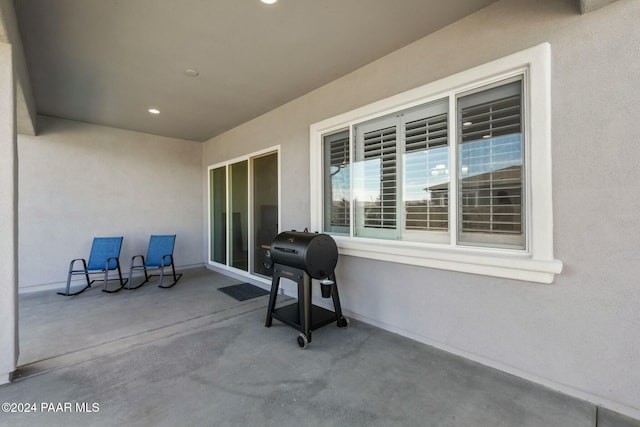 view of patio featuring a grill