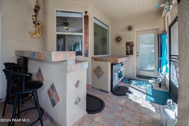 view of patio featuring ceiling fan